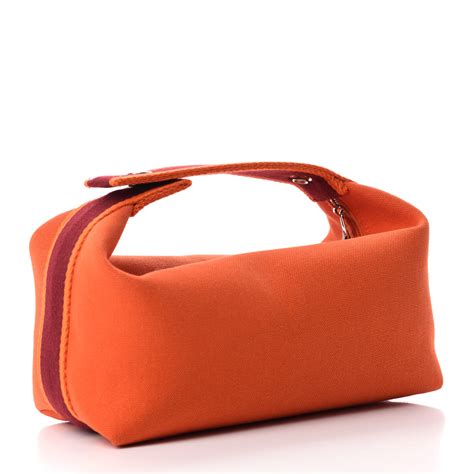 hermes orange pouch.